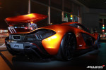 McLaren P1 poses with F1 Car in California