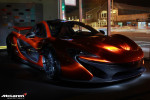 McLaren P1 poses with F1 Car in California