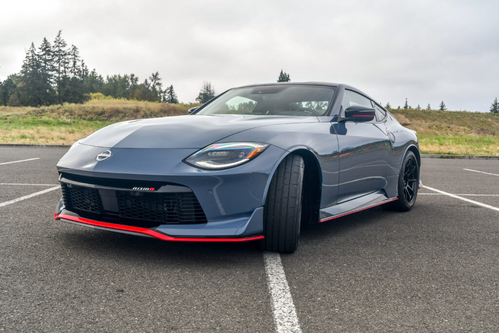 A 2024 Nissan Z Nismo in a parking lot facing the camera