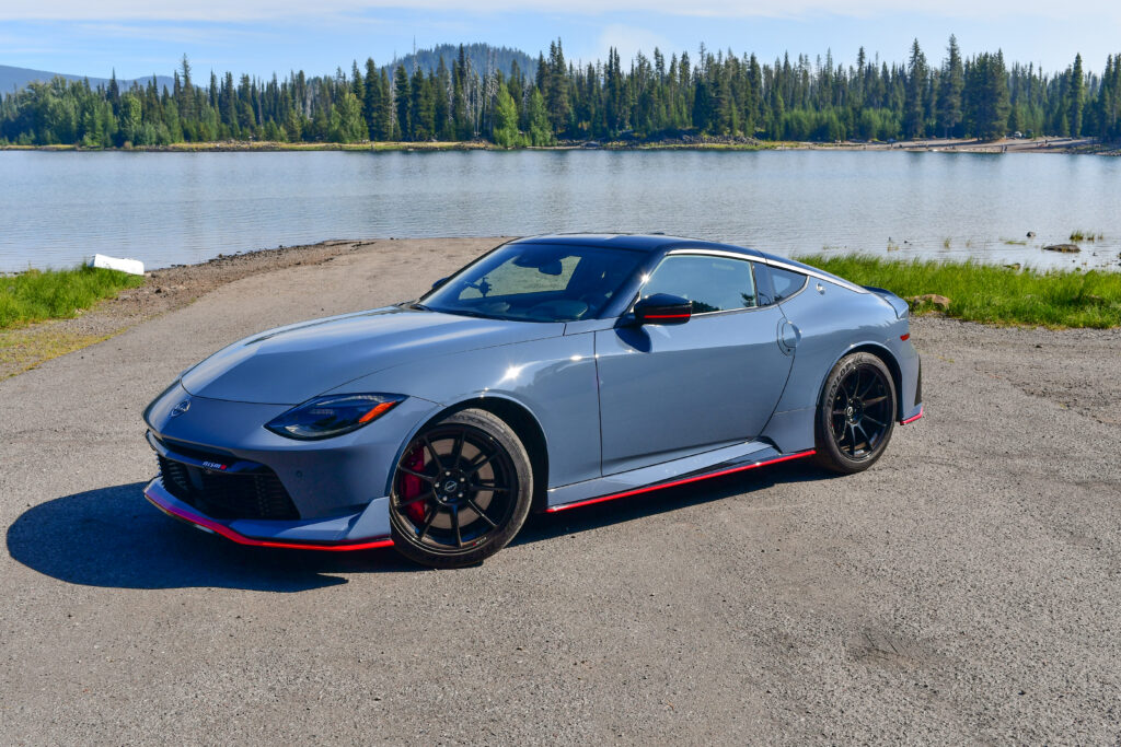 A 2024 Nissan Z Nismo in front of Oregon's Elk Lake